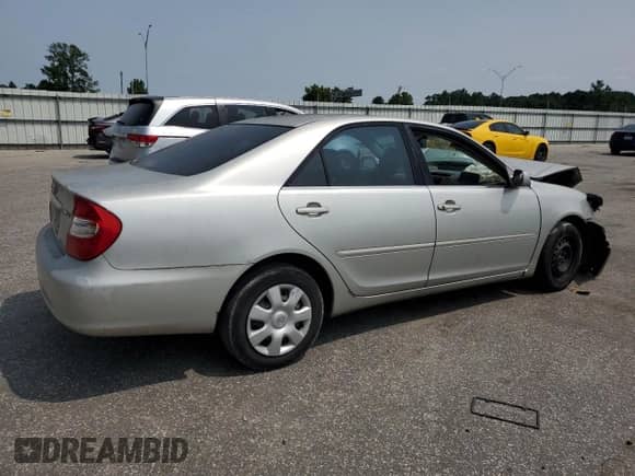 2002 Toyota Camry LE с VIN 4T1BE32K92U505665, выставлен на аукционе Copart как лот 59753255 с пробегом 237 313 миль миль и Списание • Salvage title. История ставок и продаж доступна на DreamBid. Изображение 3.