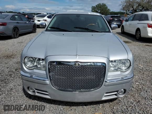 2005 Chrysler 300 C with VIN 2C3AA63H85H523036, listed as a Copart auction lot 80361325 with 219,264 mi miles and Salvage title. Bid and sale history available at DreamBid. Image 5.