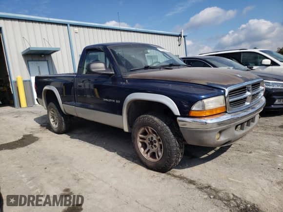2001 Dodge Dakota with VIN 1B7GG26X21S116431, listed as a Copart auction lot 74329054 with 144,055 mi miles and Salvage title. Bid and sale history available at DreamBid. Image 4.