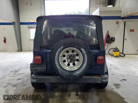1997 Jeep Wrangler Sport with VIN 1J4FY19S2VP451677, listed as a Copart auction lot 80634555 with 137,374 mi miles and Clean title. Bid and sale history available at DreamBid. Image 6.