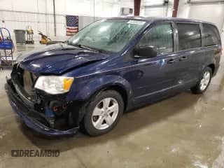 2013 Dodge Grand Caravan SE with VIN 2C4RDGBG4DR549310, listed as a Copart auction lot 82528235 with 189,157 mi miles and Salvage title. Bid and sale history available at DreamBid. Image 1.
