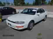 1993 Toyota Camry with VIN 4T1VK12E5PU104089, listed as a IAAI auction lot 42666936 with 123,876 mi miles and . Bid and sale history available at DreamBid. Image 2.