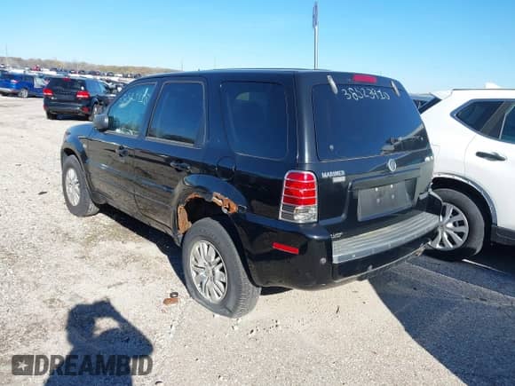 2007 Mercury Mariner Premier with VIN 4M2CU97127KJ20444, listed as a IAAI auction lot 40810464 with 163,702 mi miles and . Bid and sale history available at DreamBid. Image 3.
