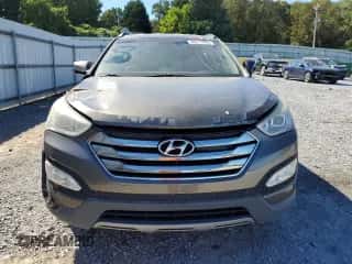 2013 Hyundai Santa Fe Sport z VIN 5XYZU3LA5DG124041, wystawiony jako Copart lot #86317095 z przebiegiem 155 372 mil mil oraz Czysty tytuł • Clean title. Historia ofert i sprzedaży dostępna na DreamBid. Obrazek 5.