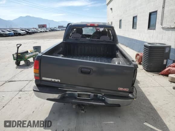 2005 GMC Sierra 1500 SLE с VIN 1GTEK19Z25Z210691, выставлен на аукционе Copart как лот 66387295 с пробегом Не указан миль и Списание • Salvage title. История ставок и продаж доступна на DreamBid. Изображение 6.
