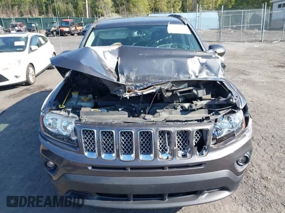 2016 Jeep Compass Latitude with VIN 1C4NJDEB9GD598368, listed as a IAAI auction lot 43222103 with 83,372 mi miles and . Bid and sale history available at DreamBid. Image 6.