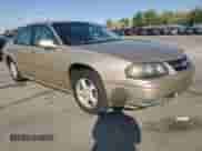 2004 Chevrolet Impala LS with VIN 2G1WH52K749177292, listed as a Copart auction lot 68552385 with 156,234 mi miles and Salvage title. Bid and sale history available at DreamBid. Image 4.