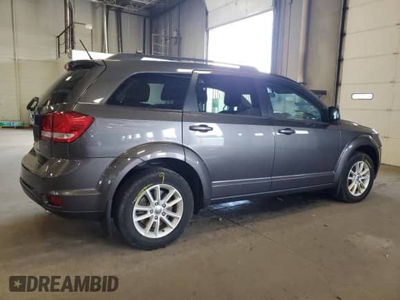 2015 Dodge Journey SXT with VIN 3C4PDDBG6FT601333, listed as a Copart auction lot 66755995 with 114,587 mi miles and Salvage title. Bid and sale history available at DreamBid. Image 3.