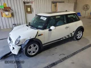 2006 MINI Hardtop with VIN WMWRC33576TJ76202, listed as a Copart auction lot 81549245 with 167,020 mi miles and Salvage title. Bid and sale history available at DreamBid. Image 1.