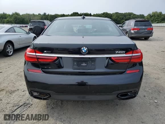 2019 BMW 7 Series 740i xDrive with VIN WBA7E4C5XKGV70108, listed as a Copart auction lot 67403785 with 62,574 mi miles and Salvage title. Bid and sale history available at DreamBid. Image 6.
