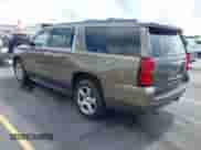 2016 Chevrolet Suburban LT z VIN 1GNSCHKCXGR346074, wystawiony jako IAAI lot #42721809 z przebiegiem 130 514 mil mil oraz . Historia ofert i sprzedaży dostępna na DreamBid. Obrazek 3.
