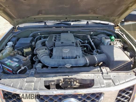 2005 Nissan Frontier SE with VIN 1N6AD07U15C402856, listed as a Copart auction lot 65883815 with 130,400 mi miles and Salvage title. Bid and sale history available at DreamBid. Image 11.