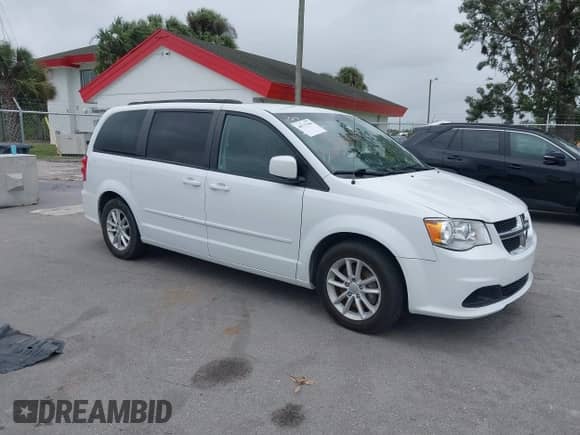 2014 Dodge Grand Caravan SXT 30th Anniversary with VIN 2C4RDGCG0ER254057, listed as a IAAI auction lot 40737960 with 142,301 mi miles and . Bid and sale history available at DreamBid. Image 1.