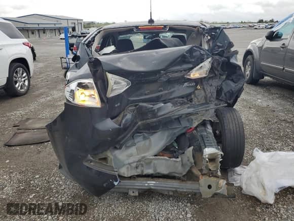 2015 Ford Fiesta SE with VIN 3FADP4BJ0FM163317, listed as a Copart auction lot 83871005 with 121,388 mi miles and Salvage title. Bid and sale history available at DreamBid. Image 6.