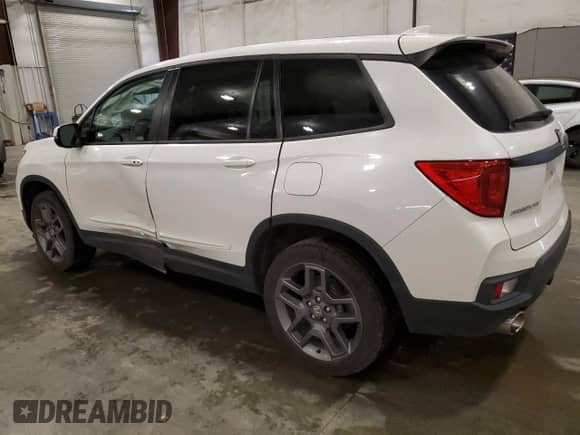 2023 Honda Passport EX-L with VIN 5FNYF8H52PB017538, listed as a Copart auction lot 68320415 with 31,933 mi miles and Salvage title. Bid and sale history available at DreamBid. Image 2.