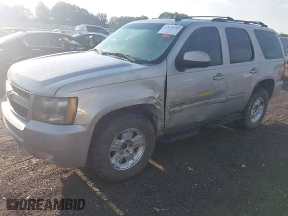 2007 Chevrolet Tahoe LT with VIN 1GNFC13J47R162173, listed as a IAAI auction lot 43076743 with 252,410 mi miles and . Bid and sale history available at DreamBid. Image 2.