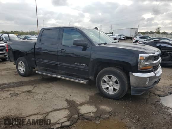 2017 Chevrolet Silverado 1500 LT with VIN 3GCUKREC1HG187498, listed as a Copart auction lot 81804755 with 143,643 mi miles and Salvage title. Bid and sale history available at DreamBid. Image 4.