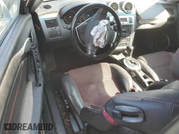2006 Hyundai Tiburon GT с VIN KMHHN65F76U229244, выставлен на аукционе Copart как лот 71157904 с пробегом 228 575 миль миль и Списание • Salvage title. История ставок и продаж доступна на DreamBid. Изображение 8.