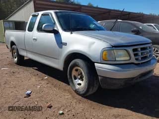 2003 Ford F-150 XL with VIN 1FTRX17233NA84161, listed as a IAAI auction lot 43456289 with 184,807 mi miles and . Bid and sale history available at DreamBid. Image 1.