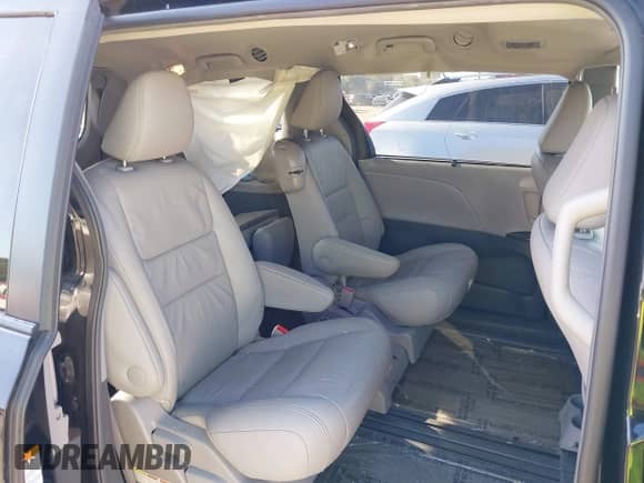 2017 Toyota Sienna XLE with VIN 5TDYZ3DC3HS771446, listed as a IAAI auction lot 43309826 with 102,712 mi miles and . Bid and sale history available at DreamBid. Image 8.