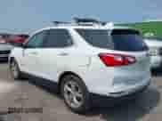 2021 Chevrolet Equinox Premier with VIN 3GNAXNEV1MS158581, listed as a IAAI auction lot 42403077 with 116,161 mi miles and . Bid and sale history available at DreamBid. Image 3.