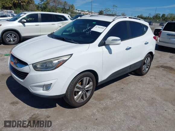 2014 Hyundai Tucson SE with VIN KM8JU3AG8EU829819, listed as a IAAI auction lot 41702183 with 90,791 mi miles and . Bid and sale history available at DreamBid. Image 2.