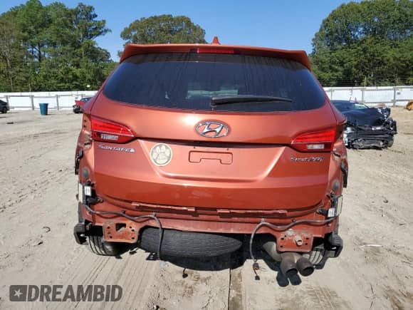 2014 Hyundai Santa Fe z VIN 5XYZWDLA8EG141059, wystawiony jako Copart lot #81478055 z przebiegiem 165 295 mil mil oraz Szkoda całkowita • Salvage title. Historia ofert i sprzedaży dostępna na DreamBid. Obrazek 6.