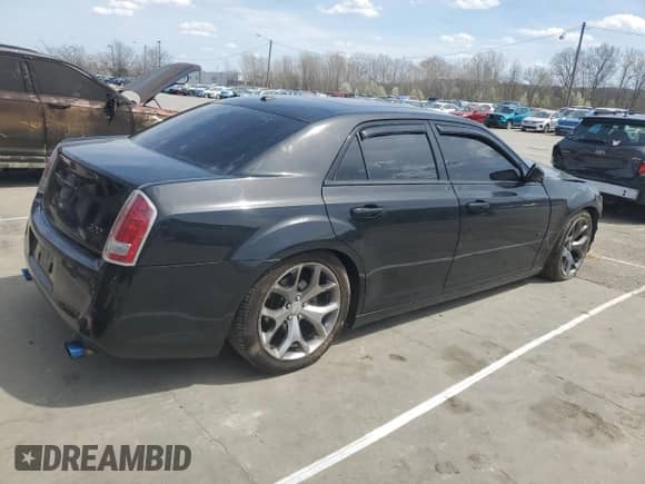 2014 Chrysler 300 S с VIN 2C3CCABT9EH352034, выставлен на аукционе Copart как лот 50960555 с пробегом 163 916 миль миль и Списание • Salvage title. История ставок и продаж доступна на DreamBid. Изображение 3.
