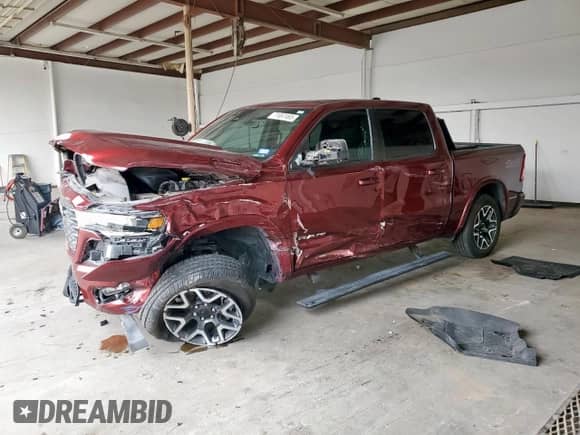 2025 Ram 1500 Laramie with VIN 1C6SRFJP9SN520448, listed as a Copart auction lot 71697495 with 5,635 mi miles and Salvage title. Bid and sale history available at DreamBid. Image 1.