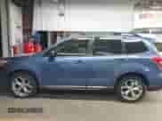 2015 Subaru Forester Touring with VIN JF2SJAUC9FH807385, listed as a IAAI auction lot 43508096 with 103,862 mi miles and . Bid and sale history available at DreamBid. Image 15.