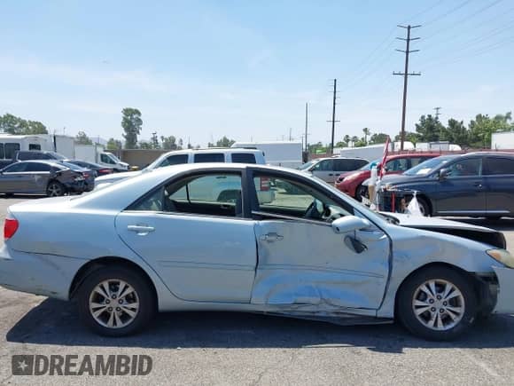 2005 Toyota Camry LE with VIN 4T1BF32K65U614571, listed as a IAAI auction lot 42328488 with 237,413 mi miles and . Bid and sale history available at DreamBid. Image 13.