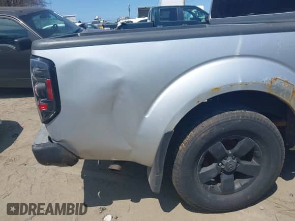 2011 Nissan Frontier Pro-4X z VIN 1N6AD0EVXBC407089, wystawiony jako IAAI lot #42113537 z przebiegiem 124 853 mil mil oraz . Historia ofert i sprzedaży dostępna na DreamBid. Obrazek 6.