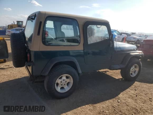 1995 Jeep Wrangler S with VIN 1J4FY19P1SP202309, listed as a Copart auction lot 69622435 with 187,977 mi miles and Clean title. Bid and sale history available at DreamBid. Image 3.