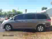 2014 Toyota Sienna LE AAS with VIN 5TDKK3DC5ES464205, listed as a IAAI auction lot 43066275 with 194,999 mi miles and . Bid and sale history available at DreamBid. Image 15.