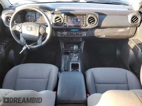 2023 Toyota Tacoma SR с VIN 3TMCZ5AN1PM589920, выставлен на аукционе Copart как лот 81328205 с пробегом 67 306 миль миль и Списание • Salvage title. История ставок и продаж доступна на DreamBid. Изображение 8.