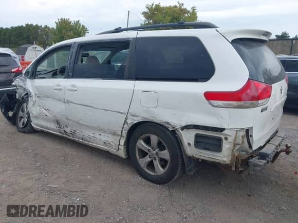 2012 Toyota Sienna LE AAS with VIN 5TDKK3DC0CS261672, listed as a IAAI auction lot 43256260 with 477,784 mi miles and . Bid and sale history available at DreamBid. Image 3.