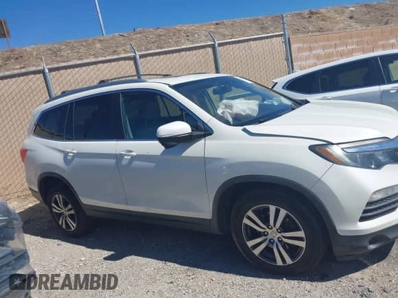 2016 Honda Pilot EX-L z VIN 5FNYF6H7XGB043603, wystawiony jako IAAI lot #43344995 z przebiegiem 211 226 mil mil oraz . Historia ofert i sprzedaży dostępna na DreamBid. Obrazek 13.