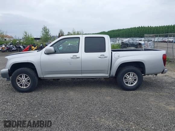 2010 Chevrolet Colorado 1LT z VIN 1GCJTCDEXA8114061, wystawiony jako IAAI lot #42235820 z przebiegiem 218 972 mil mil oraz . Historia ofert i sprzedaży dostępna na DreamBid. Obrazek 15.