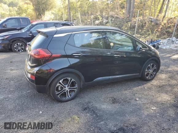 2017 Chevrolet Bolt EV Premier z VIN 1G1FX6S07H4177079, wystawiony jako Copart lot #70274503 z przebiegiem Nie podano mil oraz . Historia ofert i sprzedaży dostępna na DreamBid. Obrazek 3.