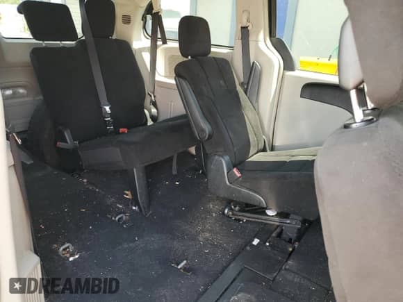 2012 Dodge Grand Caravan Crew with VIN 2C4RDGDG7CR299329, listed as a Copart auction lot 68716235 with 168,908 mi miles and Salvage title. Bid and sale history available at DreamBid. Image 11.