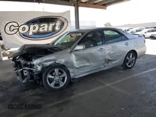 2006 Toyota Camry SE with VIN 4T1BA30K76U510688, listed as a Copart auction lot 67585845 with 136,795 mi miles and Salvage title. Bid and sale history available at DreamBid. Image 1.
