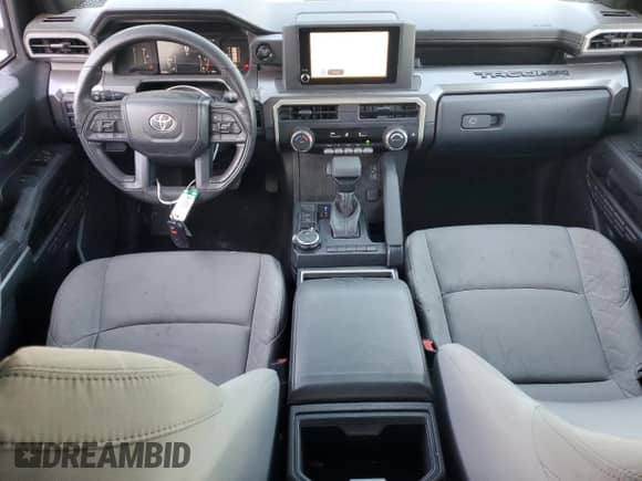 2024 Toyota Tacoma SR5 с VIN 3TMLB5JN8RM043249, выставлен на аукционе Copart как лот 87022495 с пробегом 20 083 миль миль и Чистый • Clean title. История ставок и продаж доступна на DreamBid. Изображение 8.