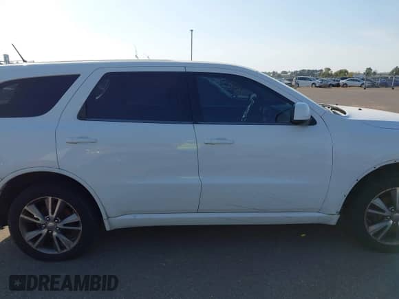 2013 Dodge Durango SXT with VIN 1C4RDJAG4DC688683, listed as a IAAI auction lot 43382985 with 205,928 mi miles and . Bid and sale history available at DreamBid. Image 13.
