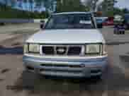 1998 Nissan Frontier XE with VIN 1N6DD26S5WC311065, listed as a Copart auction lot 84643135 with 212,985 mi miles and Salvage title. Bid and sale history available at DreamBid. Image 5.