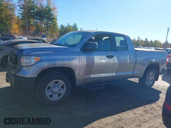 2014 Toyota Tundra SR z VIN 5TFUM5F17EX051979, wystawiony jako IAAI lot #43452681 z przebiegiem 155 857 mil mil oraz . Historia ofert i sprzedaży dostępna na DreamBid. Obrazek 14.