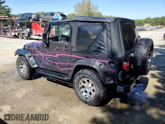 2000 Jeep Wrangler SE with VIN 1J4FA29P8YP784721, listed as a Copart auction lot 82079075 with 157,084 mi miles and Clean title. Bid and sale history available at DreamBid. Image 2.