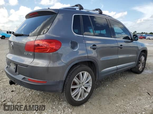 2012 Volkswagen Tiguan S с VIN WVGAV7AX4CW000140, выставлен на аукционе Copart как лот 80901355 с пробегом 133 056 миль миль и Списание • Salvage title. История ставок и продаж доступна на DreamBid. Изображение 3.