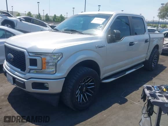 2018 Ford F-150 XL with VIN 1FTEW1CP1JKD34689, listed as a IAAI auction lot 42899519 with 127,980 mi miles and . Bid and sale history available at DreamBid. Image 19.