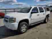 2011 Chevrolet Suburban LTZ with VIN 1GNSKKE3XBR375496, listed as a Copart auction lot 84406185 with 254,418 mi miles and Salvage title. Bid and sale history available at DreamBid. Image 1.