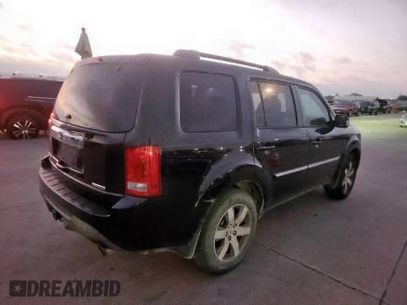 2014 Honda Pilot Touring z VIN 5FNYF3H9XEB007701, wystawiony jako Copart lot #90083335 z przebiegiem 133 779 mil mil oraz Czysty tytuł • Clean title. Historia ofert i sprzedaży dostępna na DreamBid. Obrazek 3.